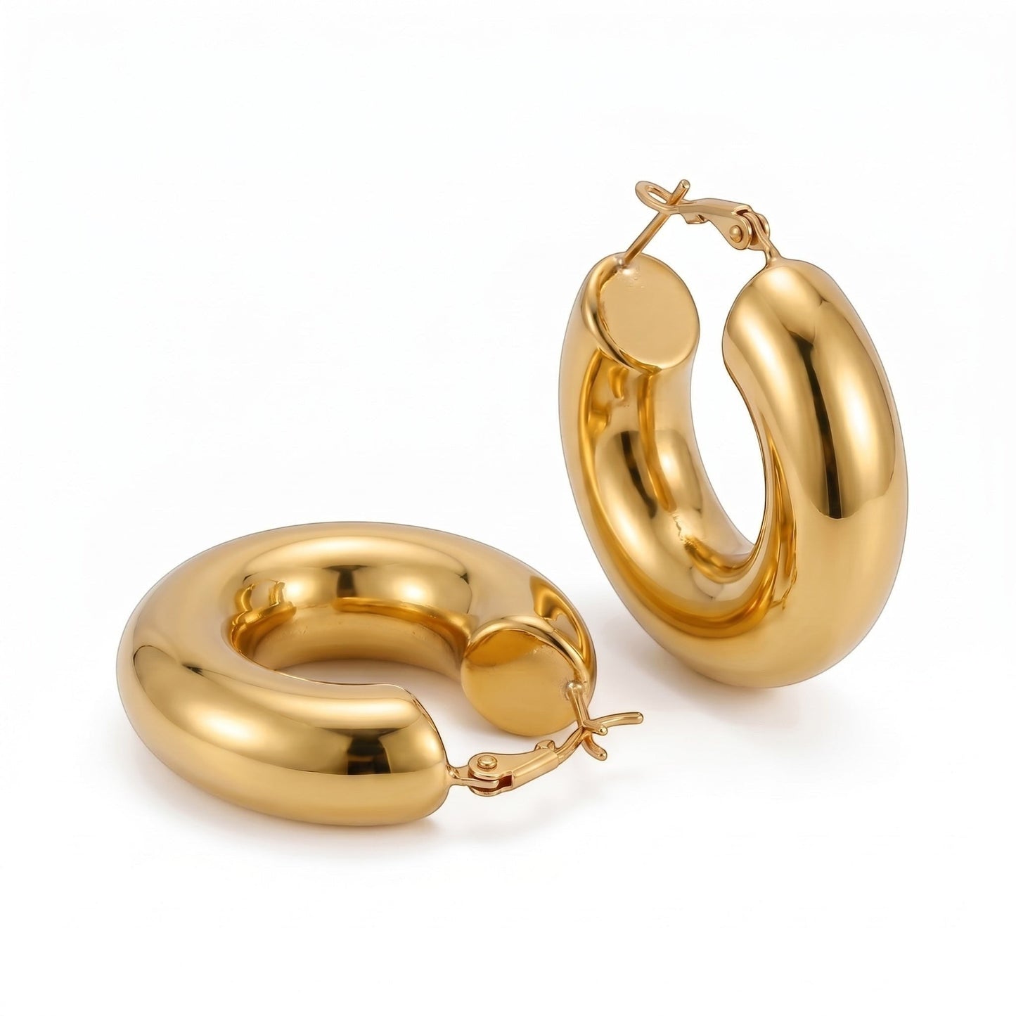 PRO RAY AENYA thick rounded gold hoop earrings, polished finish, 25mm diameter.