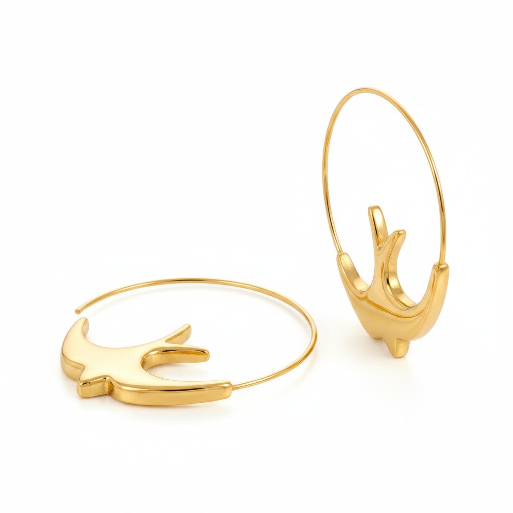 PRO RAY gold ALYRA hoop earrings with sculptural swallow design, 44mm diameter.