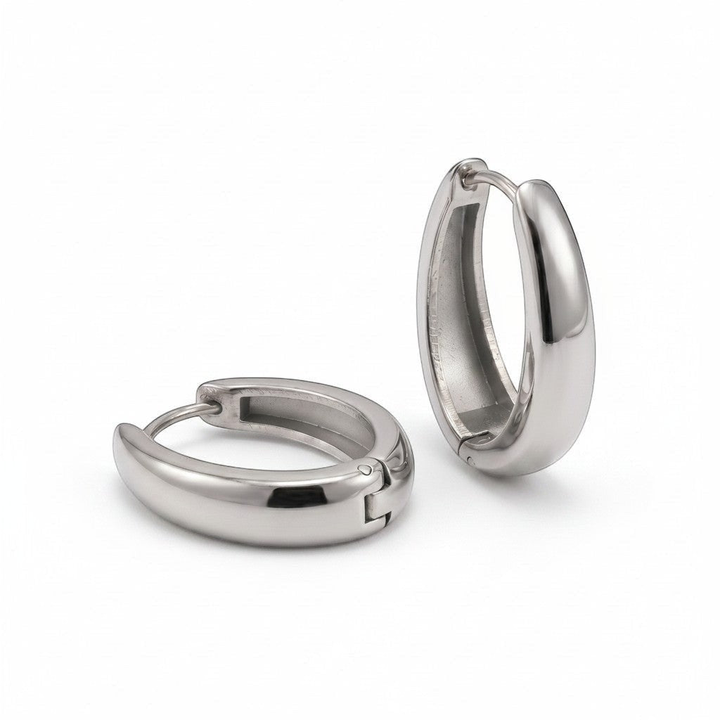 PRO RAY ARIA Hoops: polished silver sculptural huggie earrings, 23mm diameter, for everyday wear.