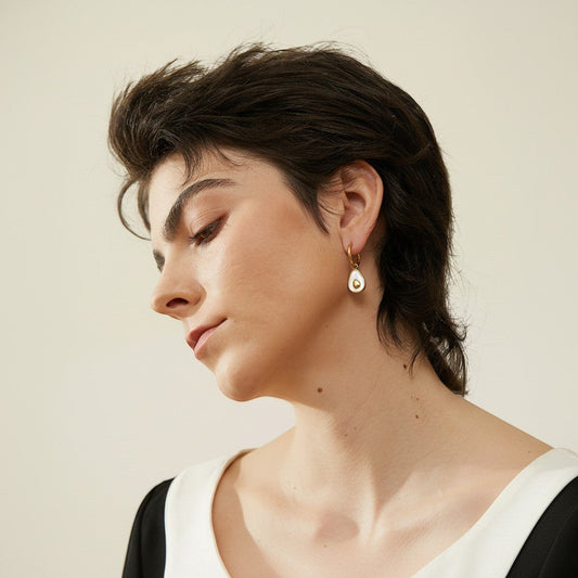 PRO RAY AVELA Drops gold hoop earrings with white shell avocado detail. Delicate statement piece.