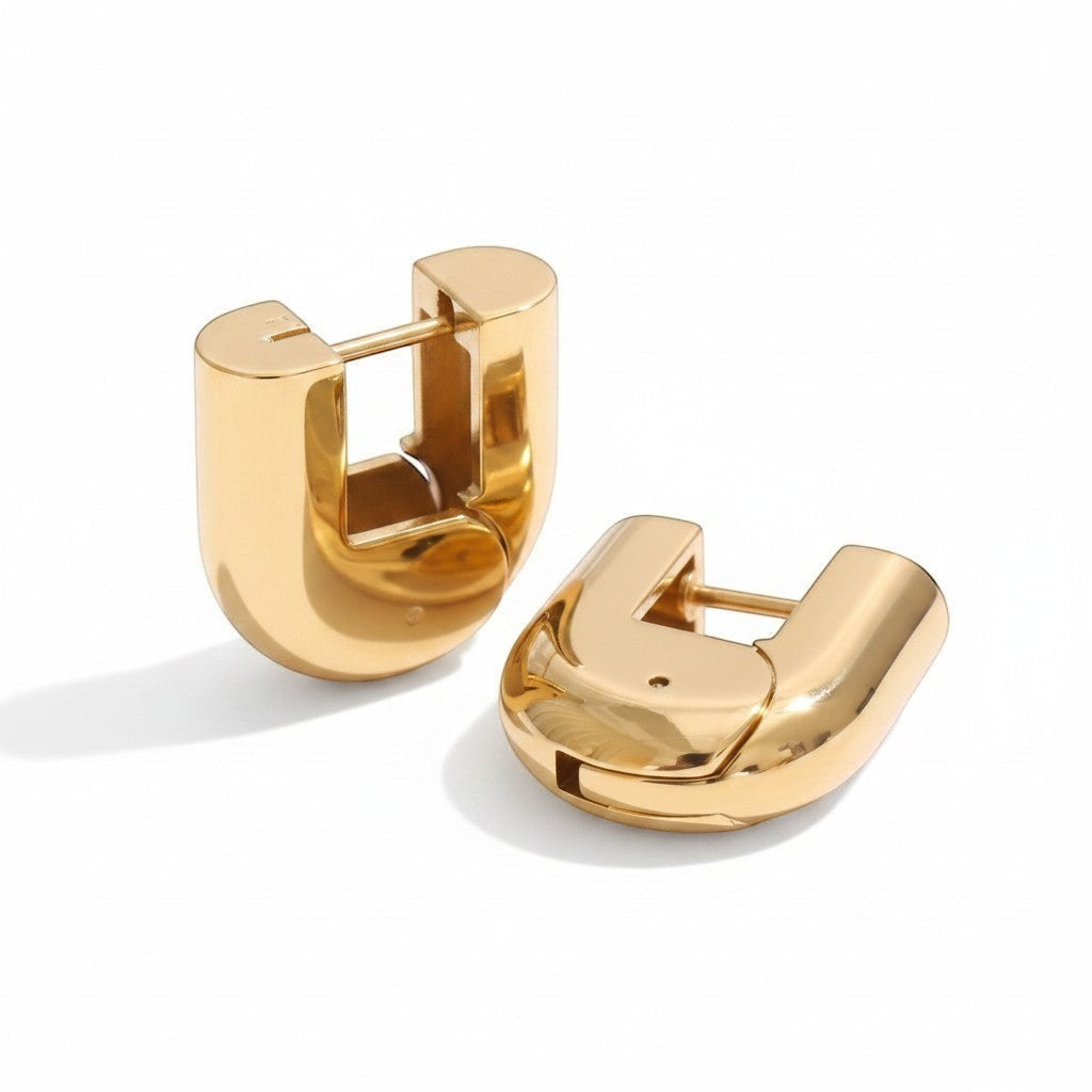 PRO RAY ELARA gold sculptural hoop earrings, 20mm diameter, smooth polished finish for everyday wear.