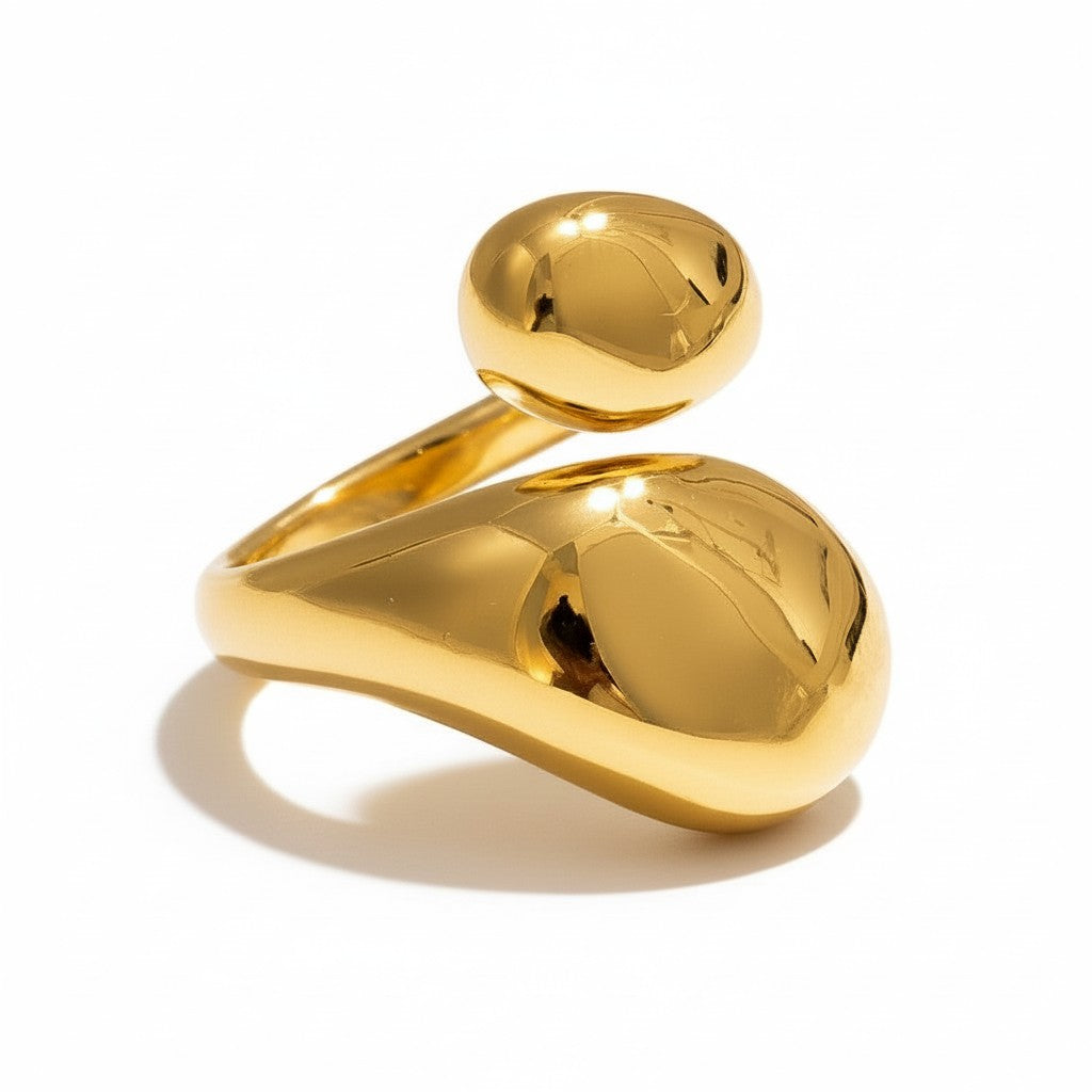 PRO RAY ELORIA open ring with smooth organic curves and a bold polished gold silhouette. Modern minimalist statement jewelry.