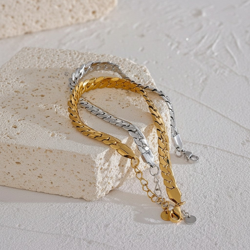 PRO RAY KAEVRA bracelet in gold and silver curb chain design with polished structured links and extender chain.