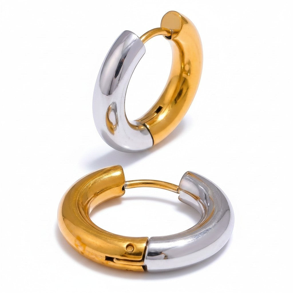 PRO RAY LIORA two tone hoop earrings in polished gold and silver finish. Smooth rounded silhouette, 20mm diameter.