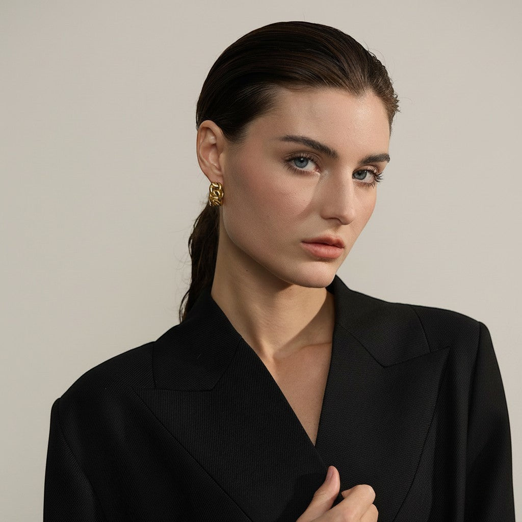 PRO RAY LYRA gold chunky chain-inspired hoop earrings with a sculptural design.