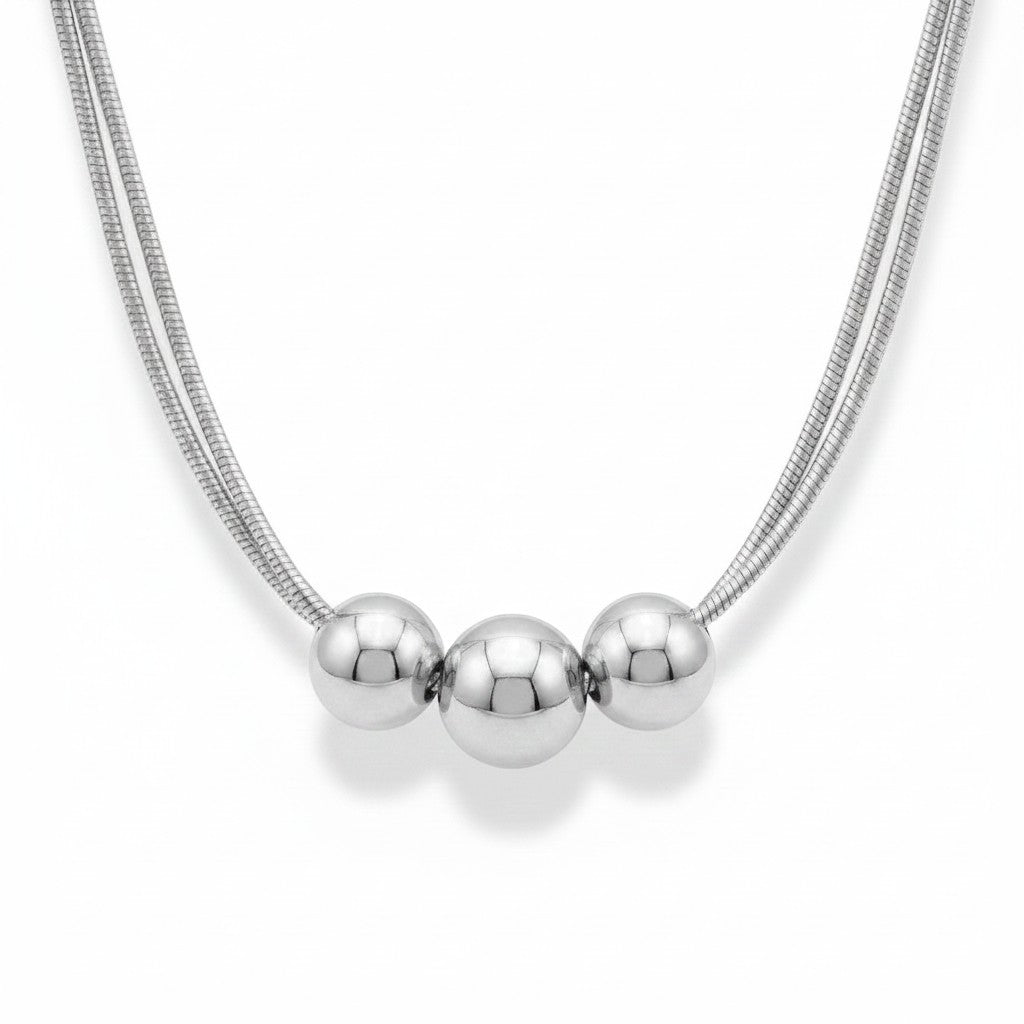 PRO RAY NOVA Necklace with three polished silver beads on a double snake chain. Modern, refined jewelry.