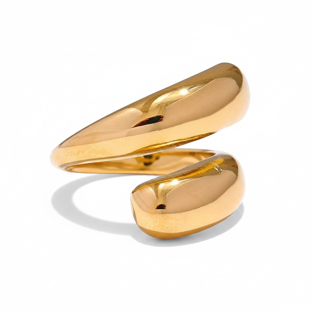 PRO RAY SERAVIA gold sculptural ring with flowing curved lines and smooth polished finish. Modern open silhouette.