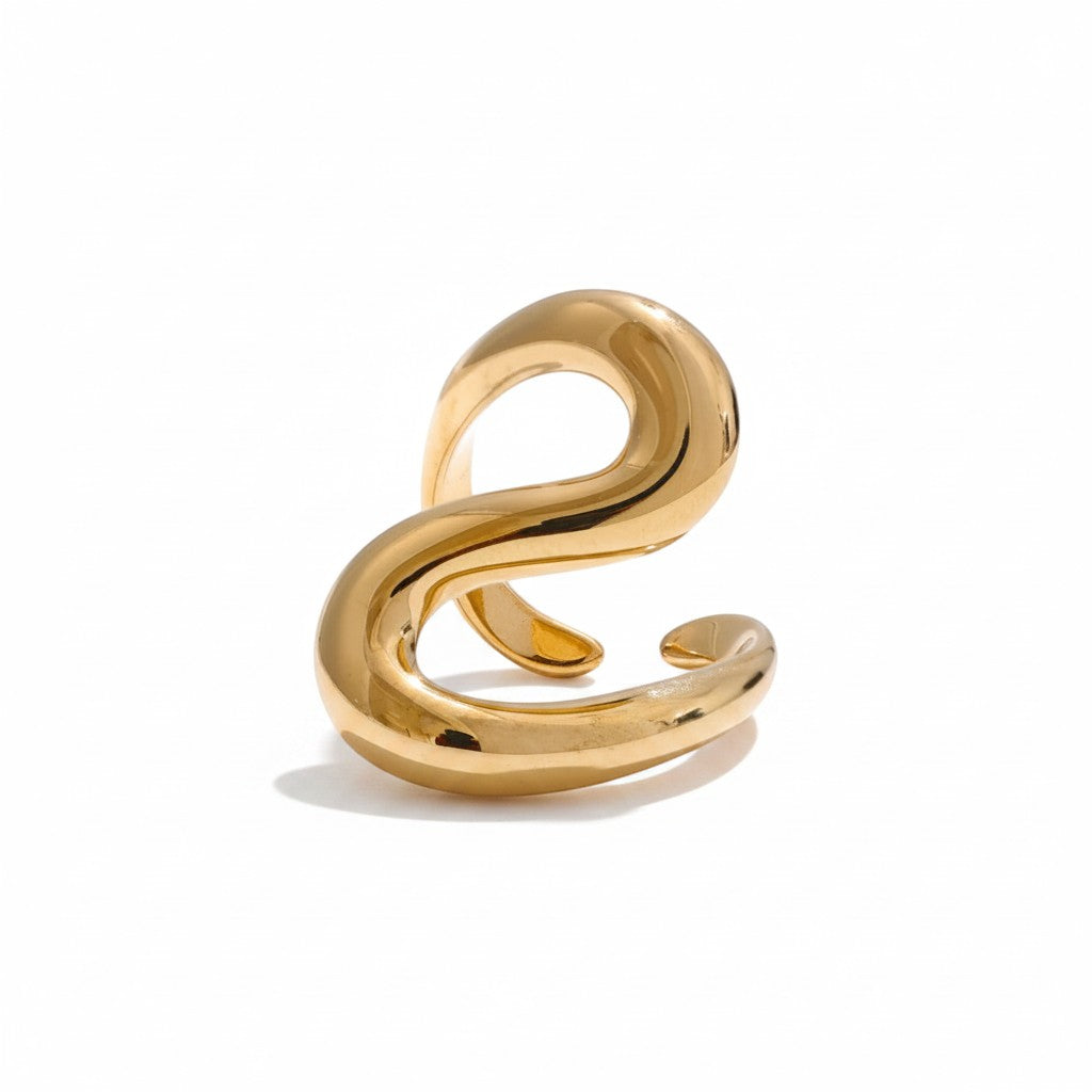 PRO RAY SORELLE open ring with fluid curved lines in polished gold tone metal. Modern sculptural design.