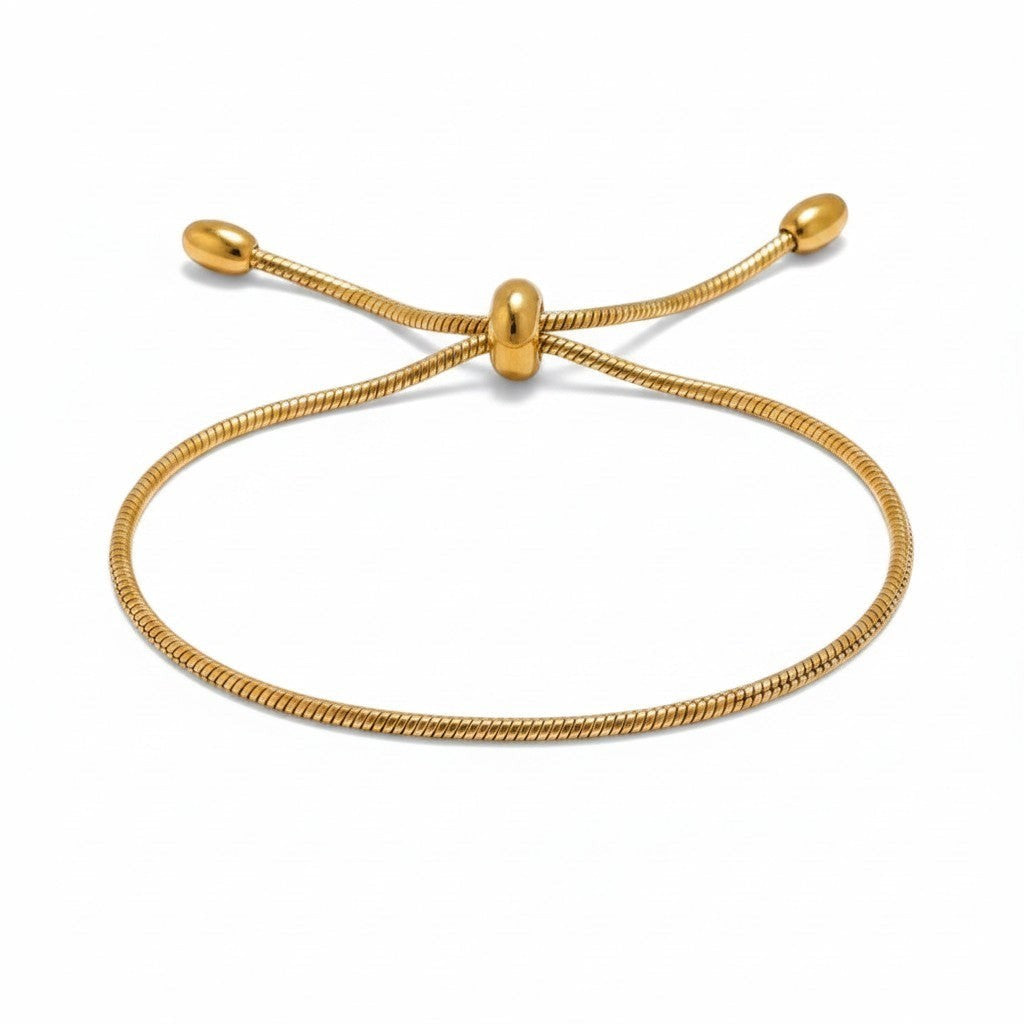 PRO RAY ZARELIA gold snake chain bracelet with adjustable slider and bead detail.