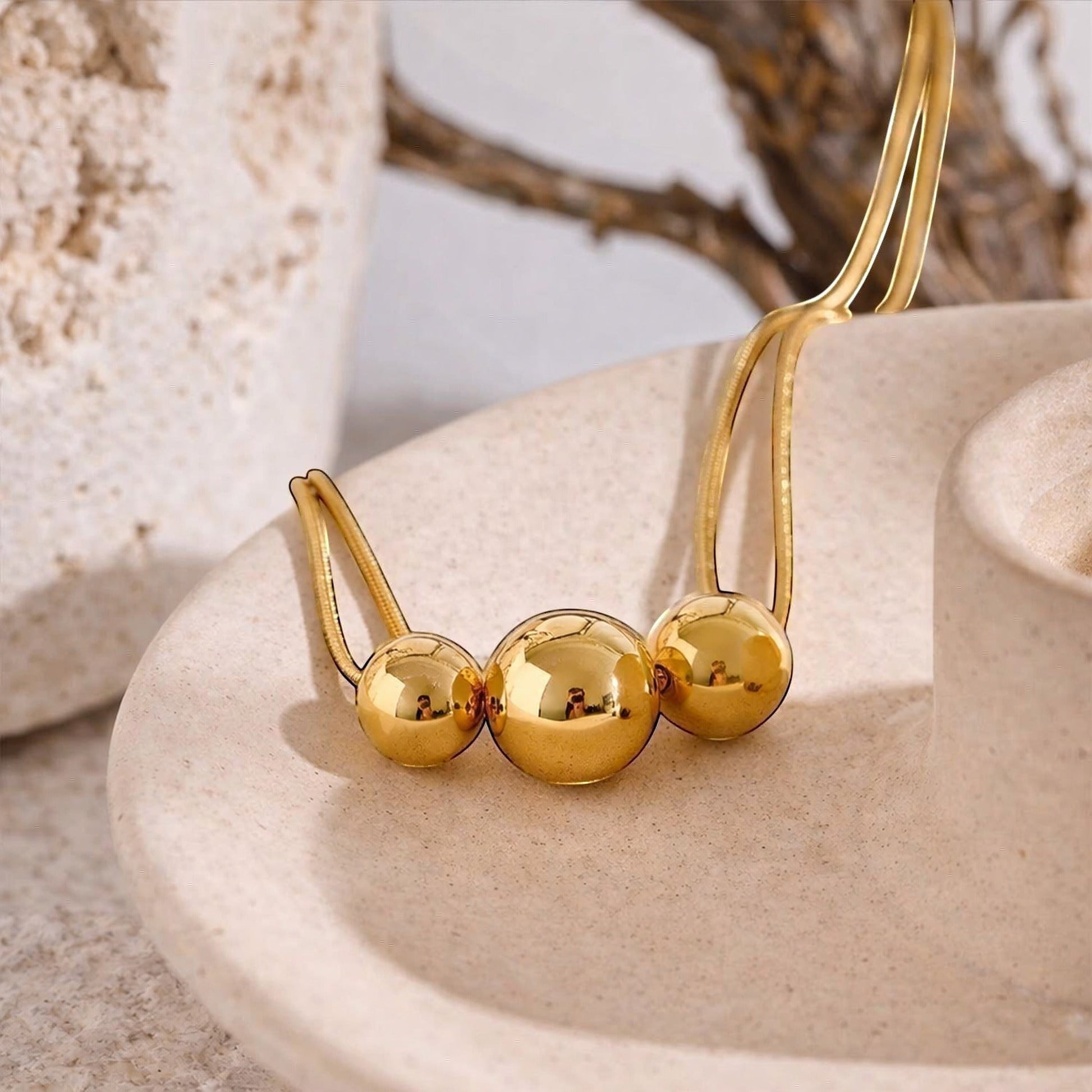 PRO RAY NOVA gold necklace lifestyle studio shot minimalist bead necklace